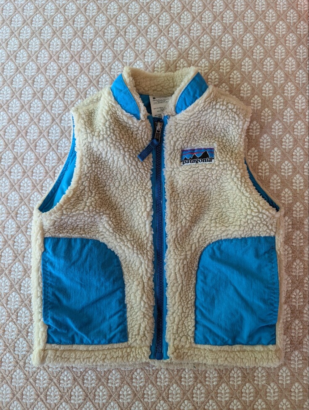 Patagonia Kids Cream Sherpa Vest with Blue Pockets and Trim